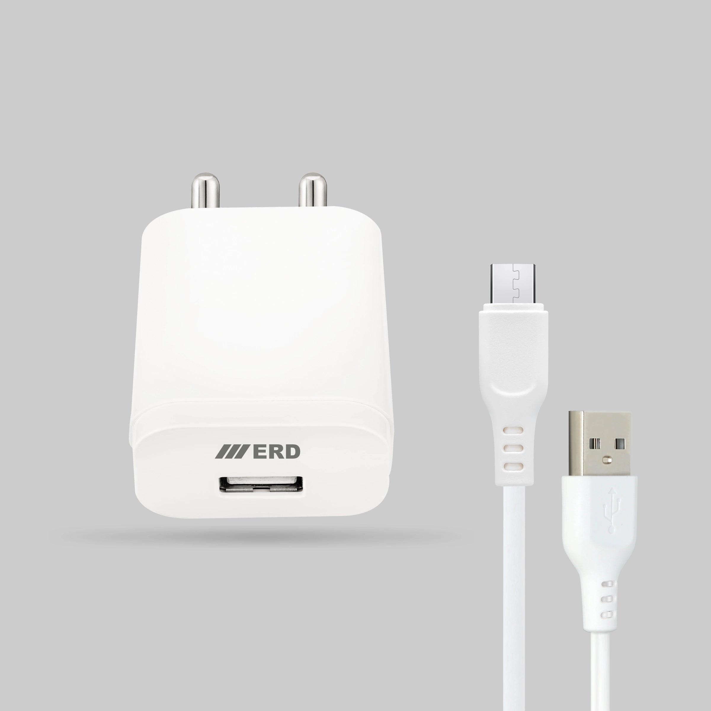 White USB charger with cable on a gray background